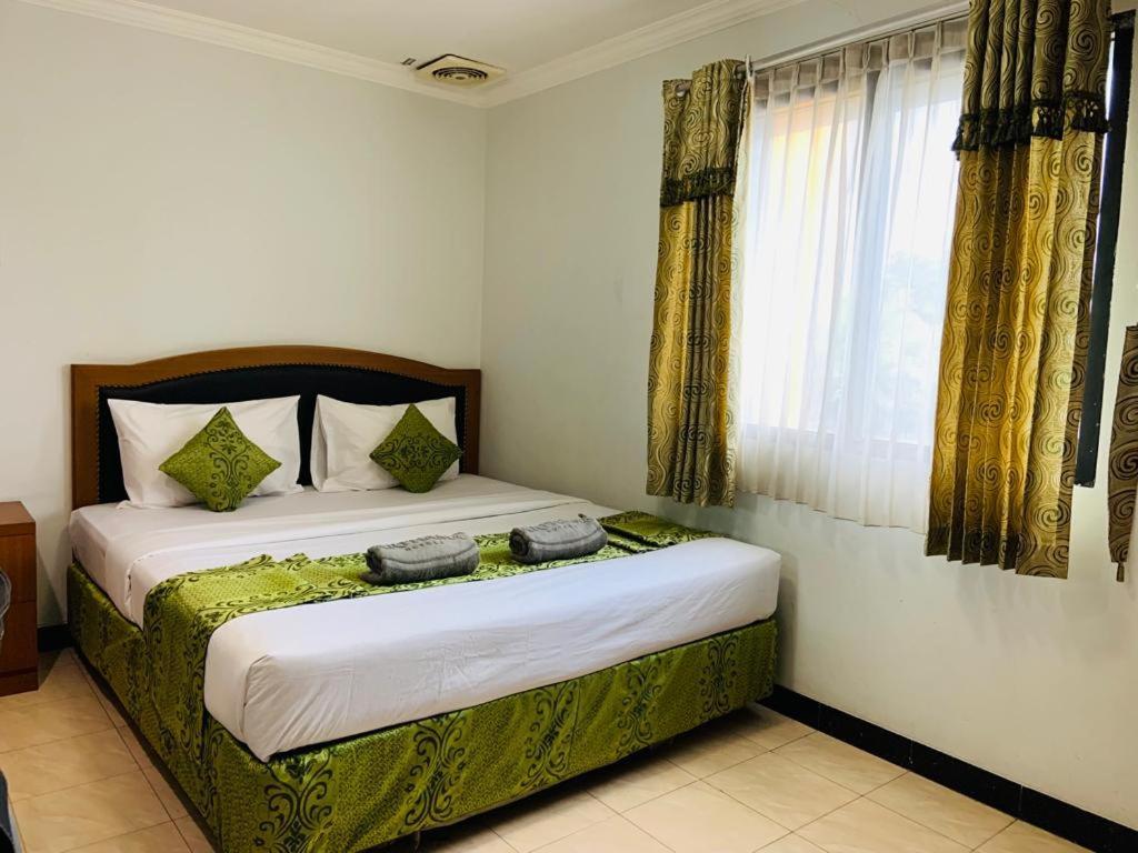 Karsa Utama Hotel Jakarta Exterior photo